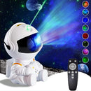 Projetor de Luz Noturna Astronauta - Transforme Seu Quarto em um Céu Estrelado!